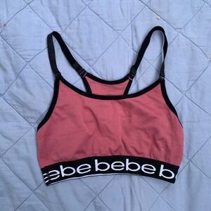 Bebe racerback sports bra in pink and black - size medium womens